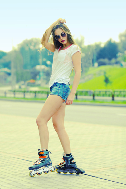 Beautiful sexy girl on roller skates - Fotó, kép