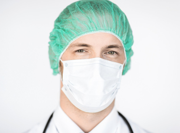 surgeon in medical cap and mask - Photo, Image