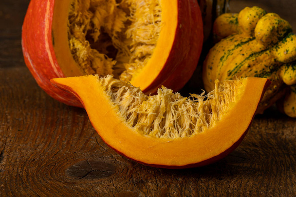 fresh pumpkin on wooden background - Фото, зображення