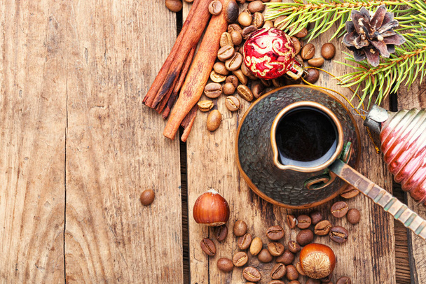 Coffee in retro cezve and christmas decoration - Foto, immagini