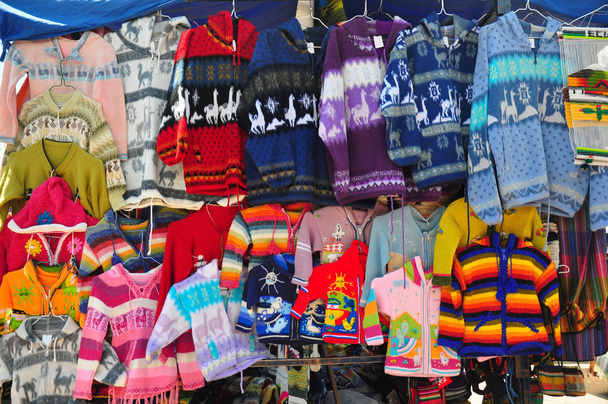 Woollen jumpers on market stall - Photo, Image