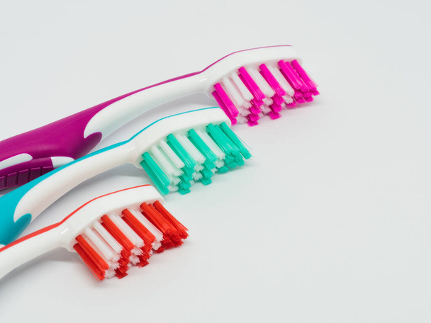 toothbrush and toothpaste on white background - Photo, image