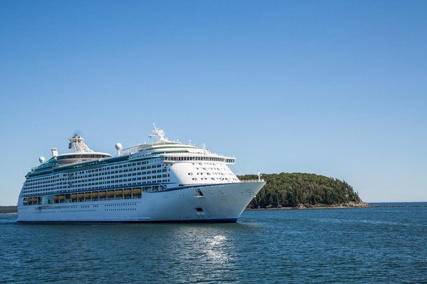Cruise Ship by Green Island on Blue Water - Photo, Image