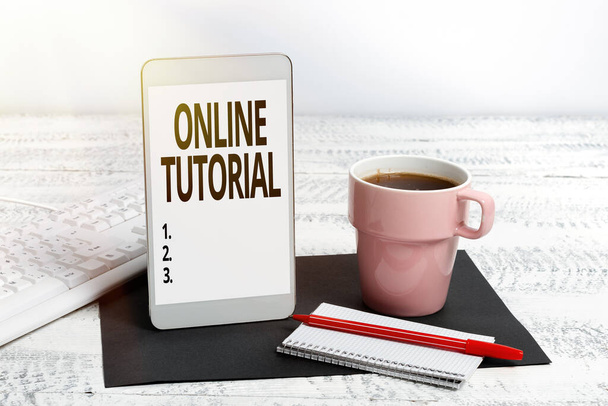 Sign displaying Online Tutorial. Business showcase process of tutoring in an online or virtual environment Wireless Communications Voice And Video Calls Writing Important Notes - Photo, Image