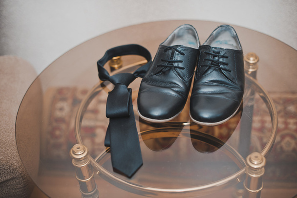 Boots and tie. - Foto, Bild