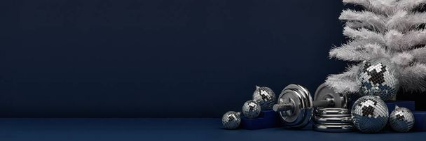 Dumbbells, Christmas fir tree and mirorr balls on dark blue background with copy space. For design of advertising, web design. Christmas and New Year. Fitness, sport or healthy lifestyle concept. - Fotó, kép