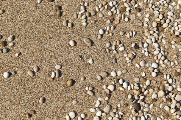 Sand and small pebbles texture background  - Фото, изображение