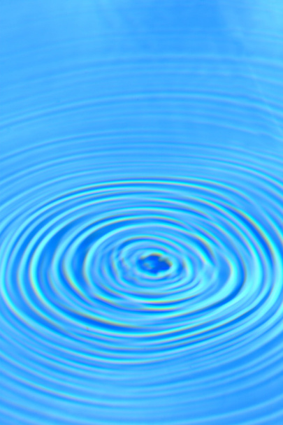 Blue clear water round ripples center background  - Photo, Image