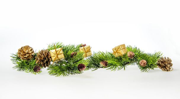 Christmas composition of tree branches and gifts - Photo, Image