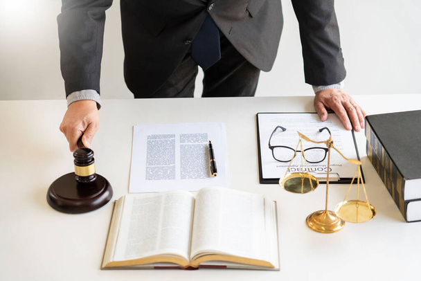 The private office workplace for consultant an young lawyer legislation with gavel and document on wood table, legal justice and judgment concept - Foto, afbeelding