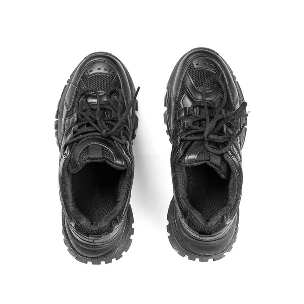 Black sports women's running shoes. Close up. Isolated on white background. - Valokuva, kuva
