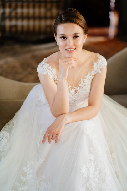 beautiful and gentle bride in a white lace wedding dress.  - Photo, image