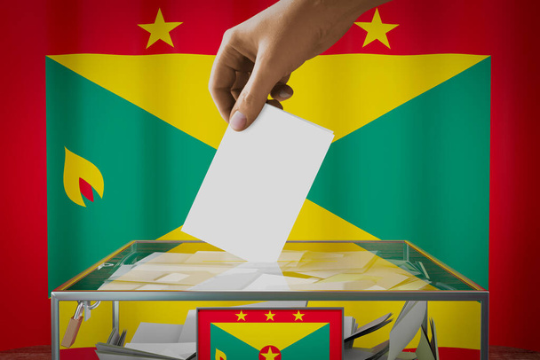 Grenada vlag, hand laten vallen stemkaart in een doos - stemming, verkiezingsconcept - 3D illustratie - Foto, afbeelding