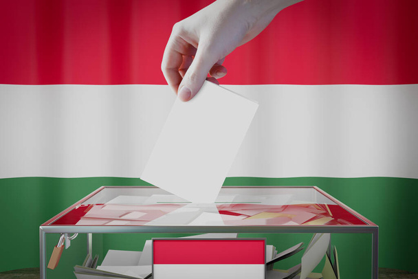 Ungheria bandiera, mano cadere scheda elettorale in una scatola - voto, concetto di elezione - Illustrazione 3D - Foto, immagini