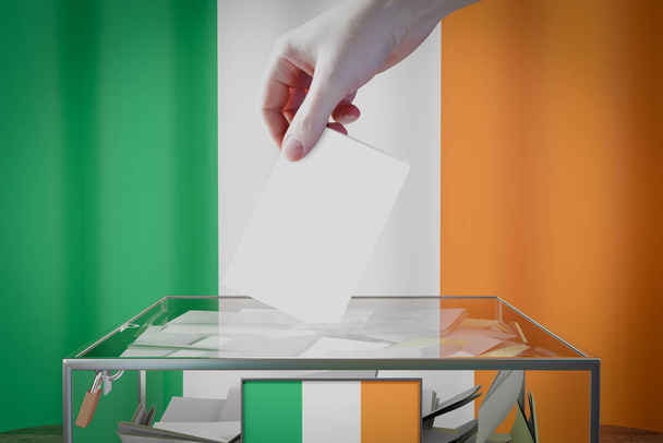 アイルランドの旗、投票カードを箱に落とす-投票、選挙のコンセプト- 3Dイラスト - 写真・画像