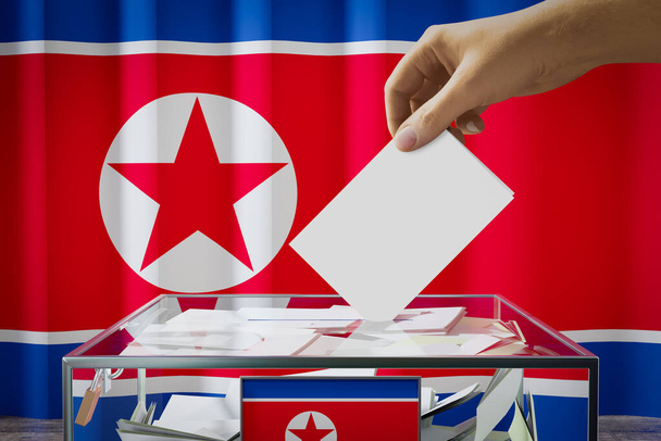 Drapeau de la Corée du Nord, dépôt à la main d'une carte de vote dans une boîte - vote, concept électoral - illustration 3D - Photo, image