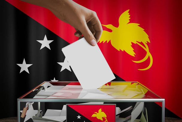 Bandera de Papúa Nueva Guinea, mano dejando caer la tarjeta de votación en una caja - votación, concepto electoral - Ilustración 3D - Foto, Imagen