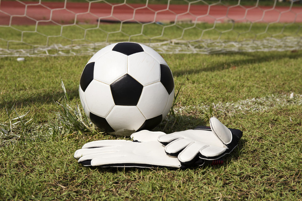 Gloves and soccer ball - Fotoğraf, Görsel