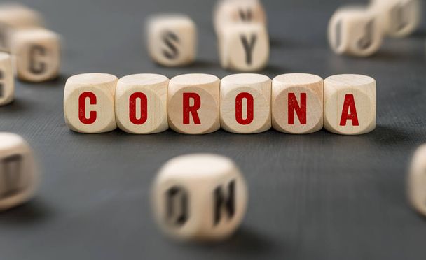 Letter dice with the word Corona - Fotografie, Obrázek