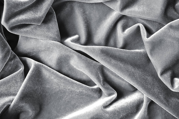 abstract texture of draped Gray background. eautiful textile backdrop. Close-up. Top view - 写真・画像