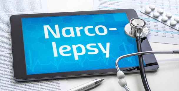 The word Narcolepsy on the display of a tablet - Photo, Image