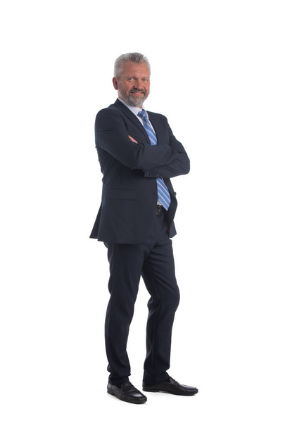 Confident mature businessman standing full length isolated on white background - Fotografie, Obrázek