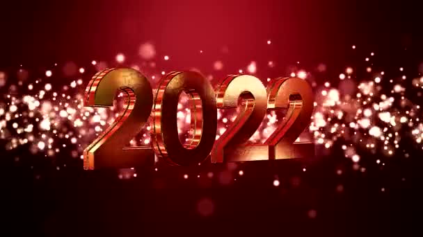 Video animation of christmas golden light shine particles bokeh over red background and the numbers 2022 - represents the new year - vacation concept - Footage, Video