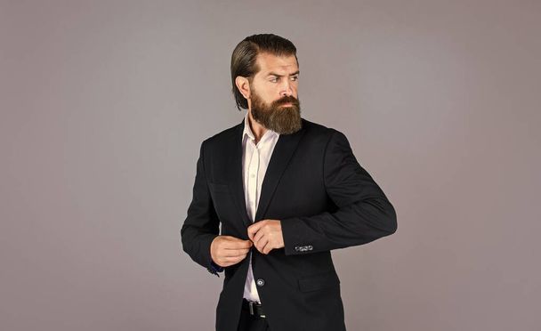 brutal businessman with perfect beard and moustache. real boss in jacket. mature man has serious look. confidence and charisma. handsome man wear office suit. male beauty and fashion - Foto, imagen