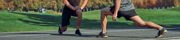 The two men doing exercise outdoor - Photo, Image