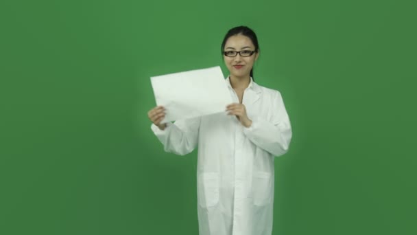 Girl scientist with blank sign - Footage, Video