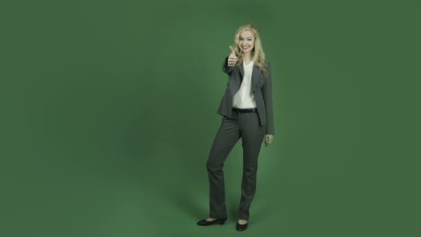 Businesswoman with thumb up sign - Materiał filmowy, wideo