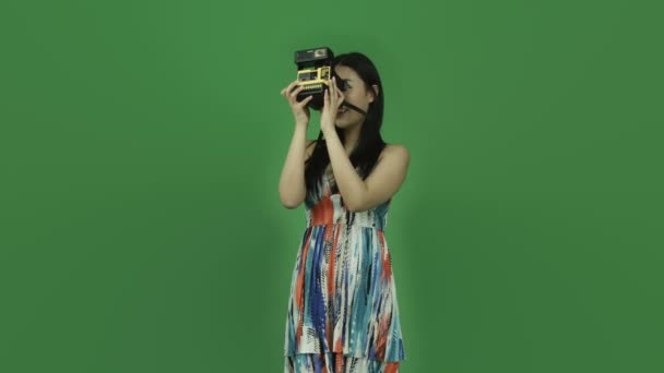 Girl taking photography on polaroid - Кадры, видео