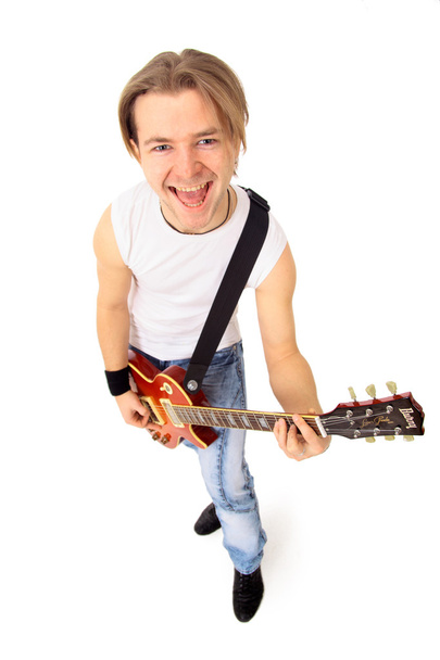 Young boy with electrical guitar isolated on a over white background - Photo, Image