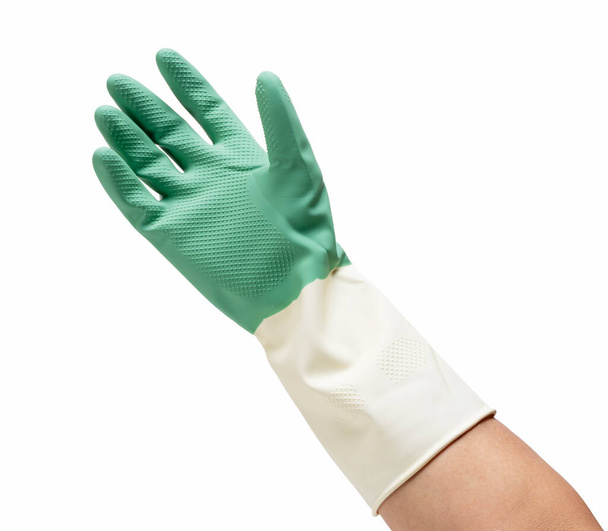 A man's hand wearing a rubber glove against a white background. Concept of cleaning - Photo, Image