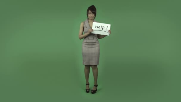 Business woman with help sign - Materiał filmowy, wideo