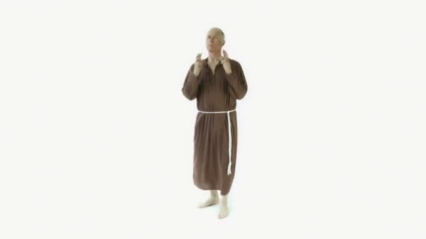 Mönch drückt die Daumen für Glück - Filmmaterial, Video