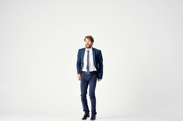 man in suit manager office emotions motion light background - Foto, imagen