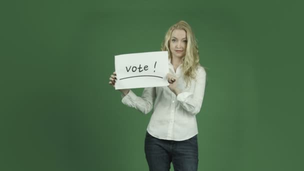 Mujer elección con signo de voto
 - Imágenes, Vídeo