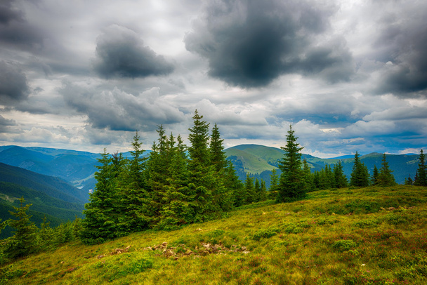 beautiful mountain landscape with dramatic clouds - 写真・画像