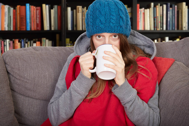 woman with flu on the couch - Photo, image