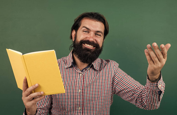 happy mature college guy holding book, happiness - Фото, зображення