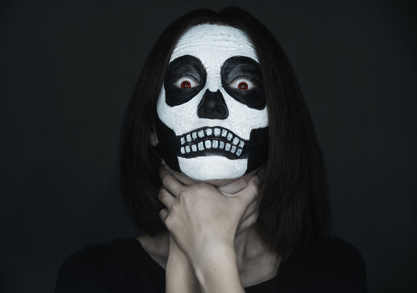 Scary woman with skull make-up - Фото, изображение