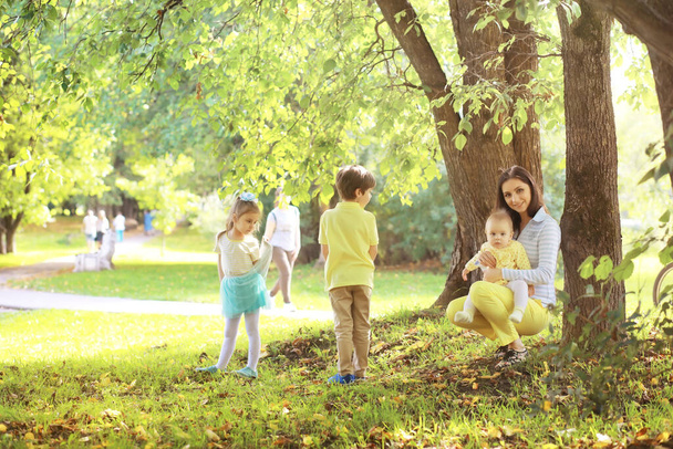 Family with children for walk in autumnin  park  - Fotoğraf, Görsel
