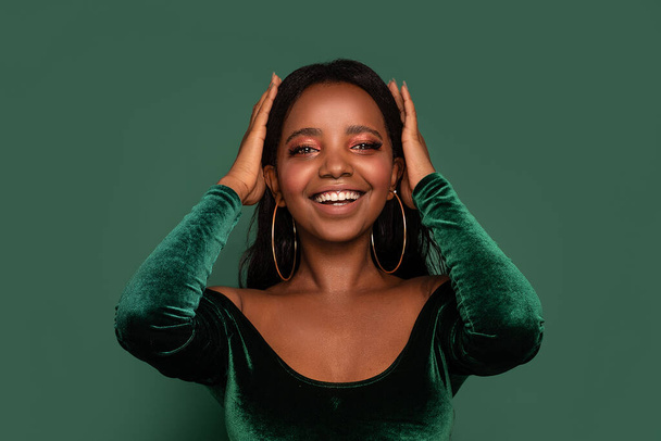 Happy african american woman smiling. Beauty female portrait. Young emotional woman. Elegant girl, party style. Real human emotions, facial expression concept - 写真・画像