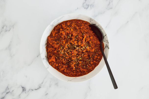vegan bolognese sauce with red lentils and textured vegetable protein, healthy plant-based food recipes - 写真・画像