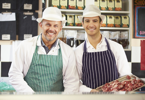 Two Butchers At Work In Shop - Fotó, kép