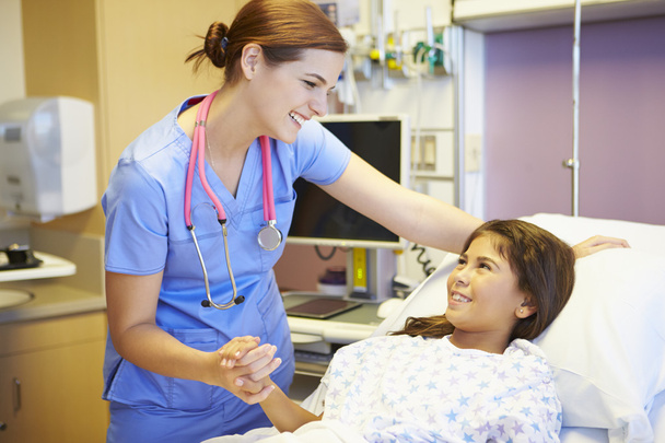 Young Girl Talking To Female Nurse In Hospital Room - Fotó, kép