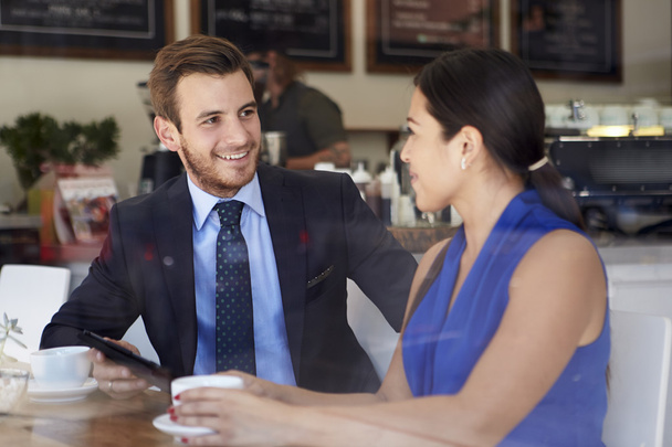 Businessman And Businesswoman Meeting In Coffee Shop - Foto, Imagem