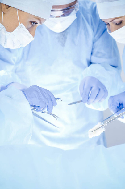 A group of surgeons is operating at the hospital. Health care concept - Foto, Imagem