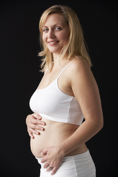 Pregnant Woman Wearing White - Fotografie, Obrázek